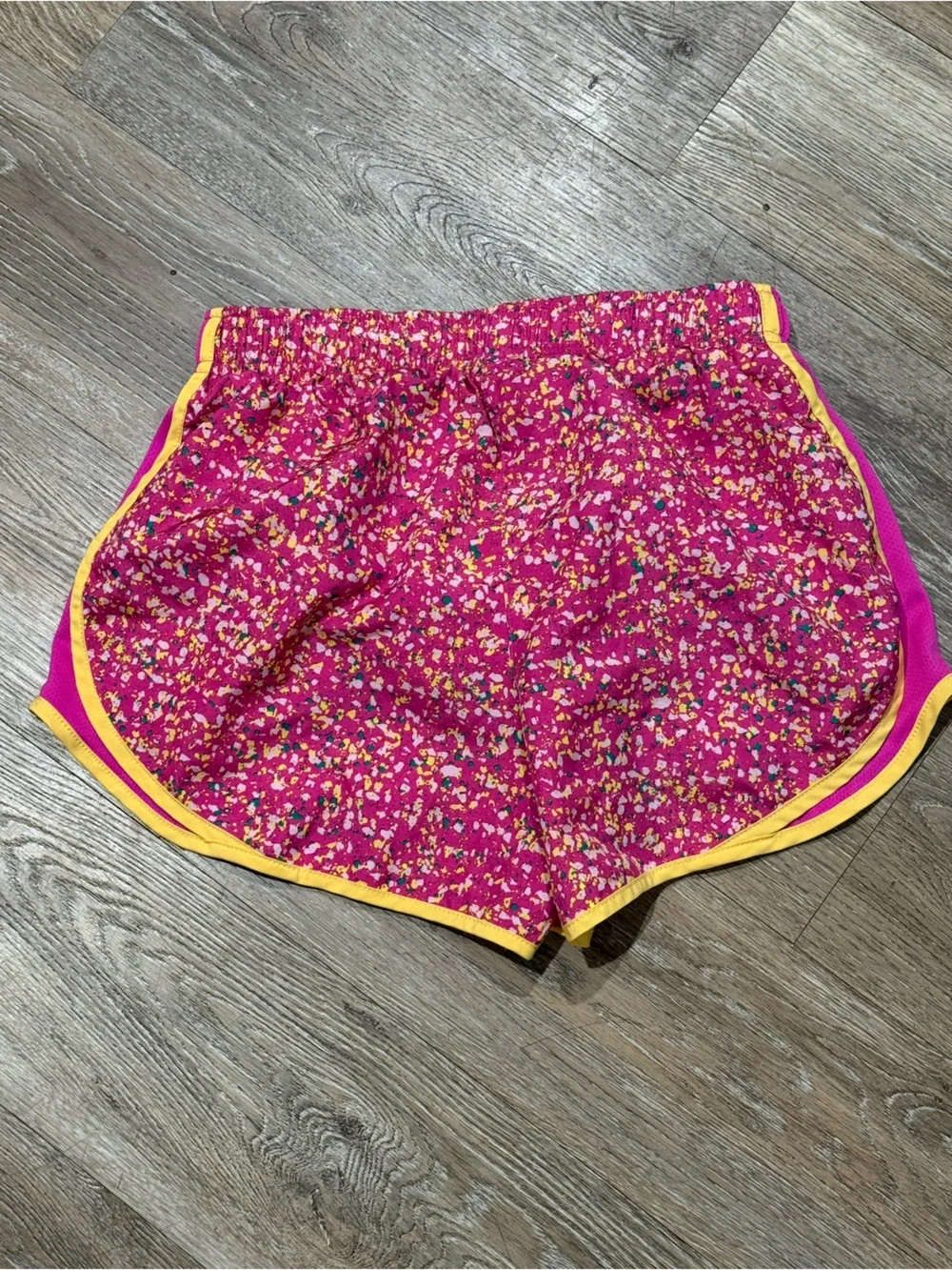 Nike Women’s Fuchsia Floral Athletic Shorts with Yellow Trim